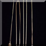 J03. Gold necklaces.